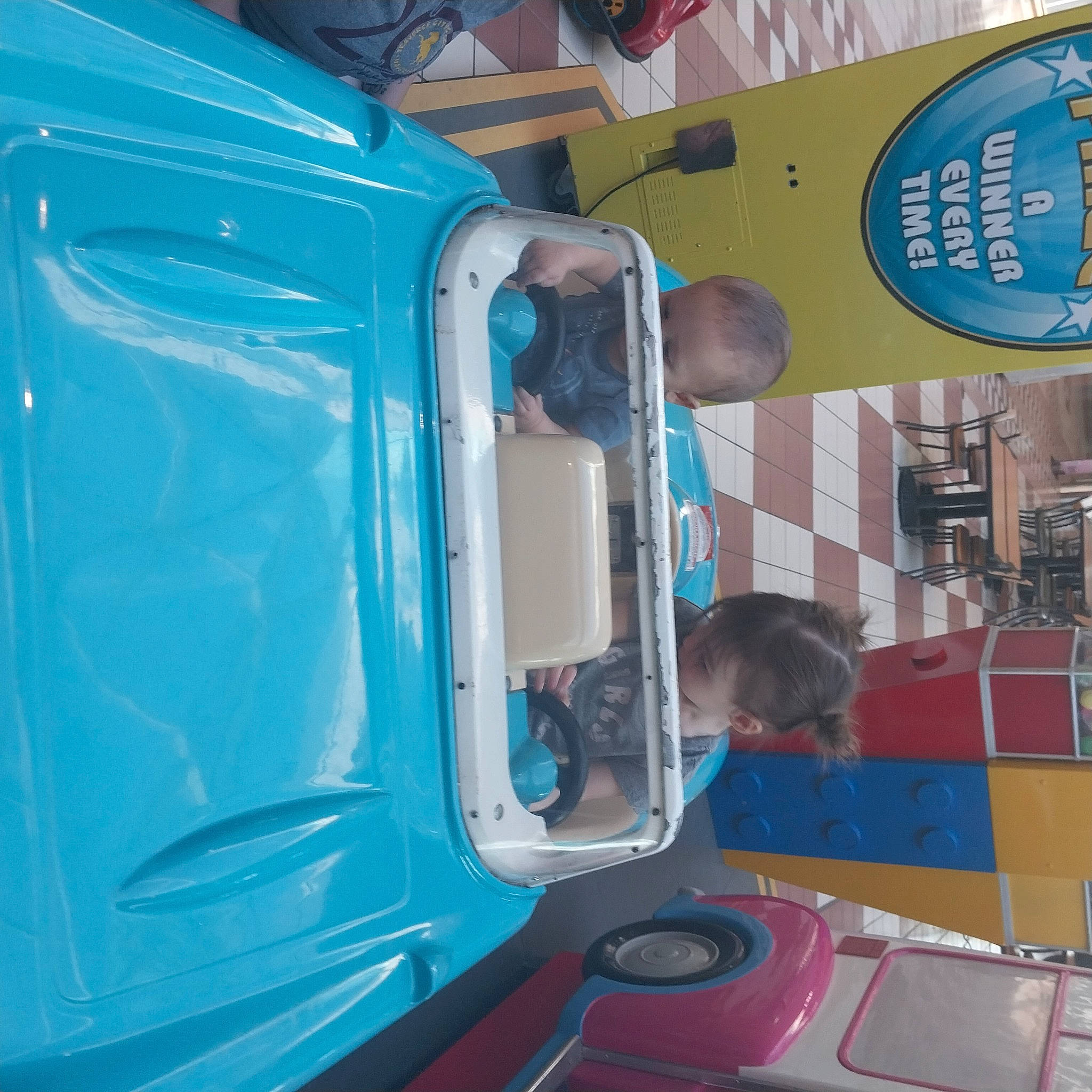 Onyx is registered to the contest to win money with this photo: auto_part, automotive_design, automotive_exterior, automotive_lighting, automotive_tail_brake_light, automotive_tire, automotive_wheel_system, blue, bumper, electric_blue, engineering, fender, gas, hood, machine, motor_vehicle, person, product, t_shirt, vehicle