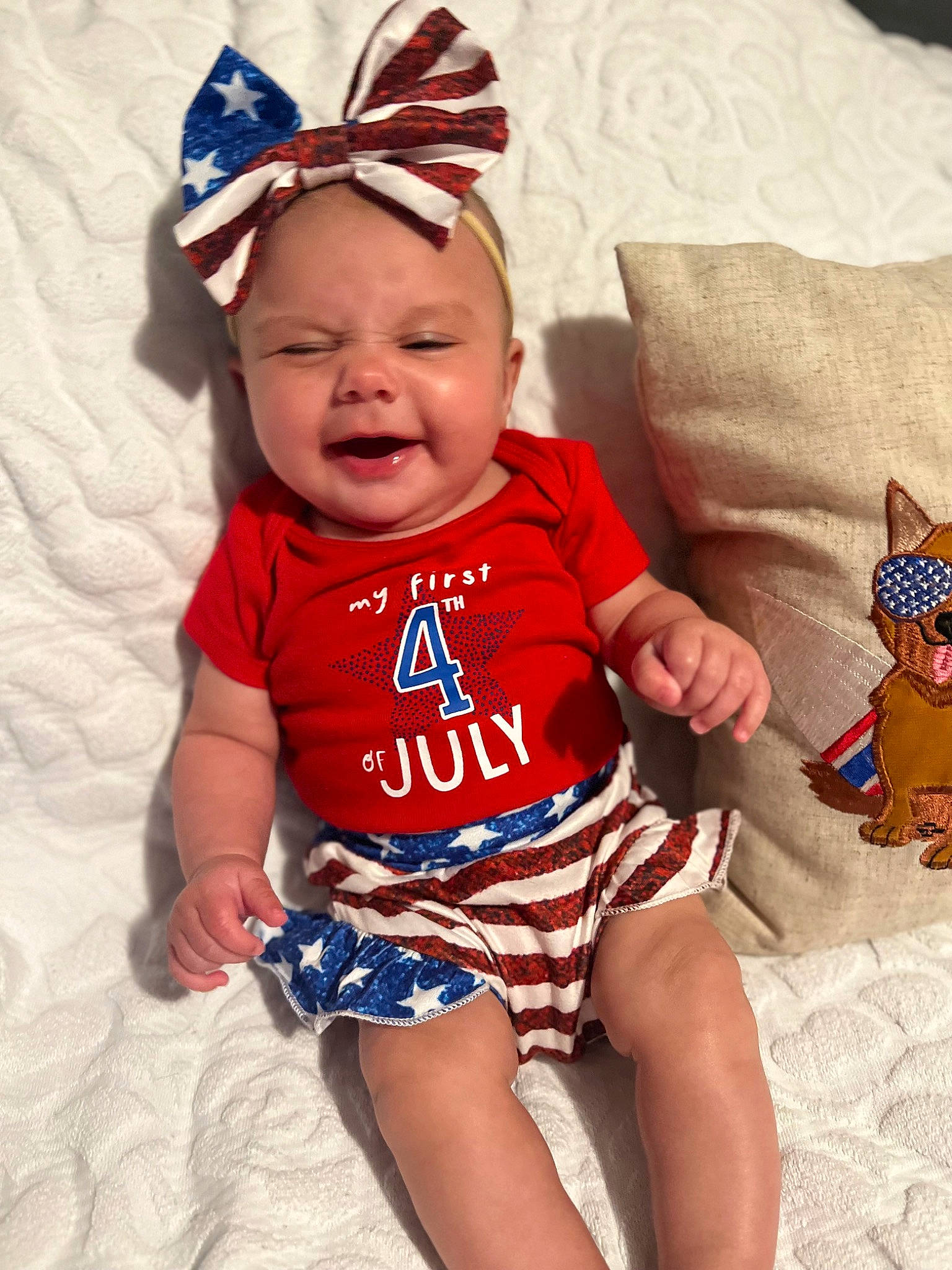 Mazie is registered to the contest to win money with this photo: arm, baby, baby_toddler_clothing, cool, face, finger, happy, head, headgear, headwear, leg, organ, person, pink, red, skin, sleeve, smile, t_shirt, textile