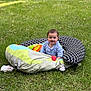 Biliie participe au concours pour gagner de l'argent avec cette photo : baby, child, grass, outdoor, toy, cushion, smile, happy, infant, playtime, greenery, nature, casual, daylight, sitting, clothing, head, face, cute, young