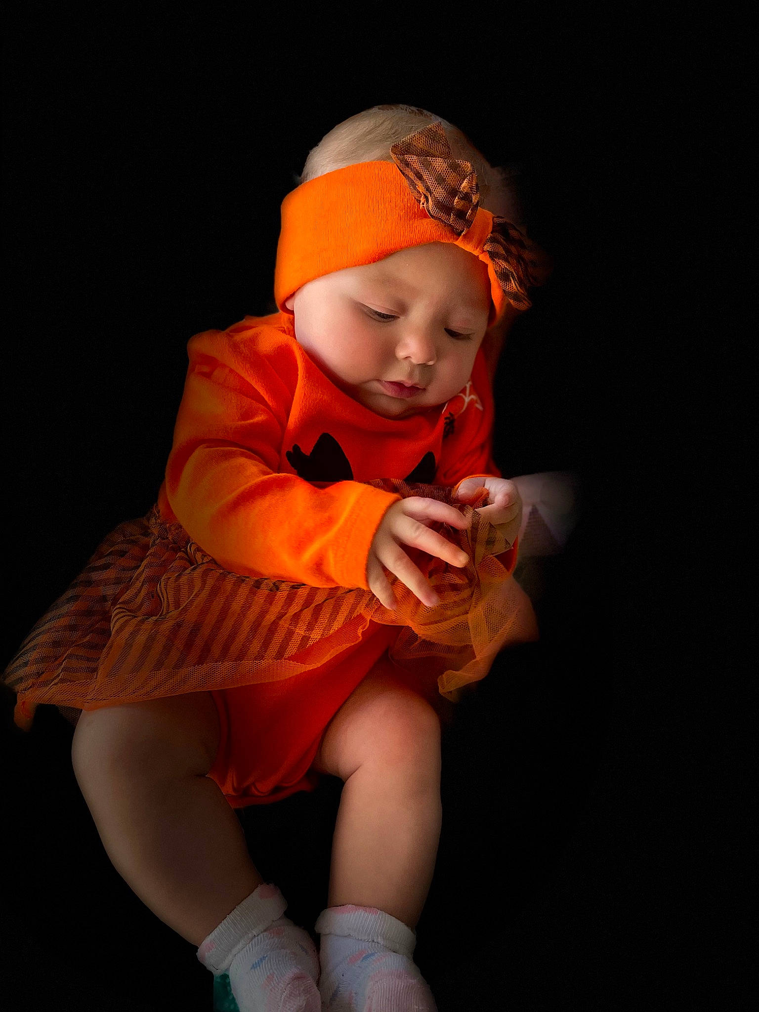 Mackenzie is registered to the contest to win money with this photo: baby, baby_toddler_clothing, cap, child, costume, dress, flash_photography, fun, hat, headgear, headwear, human_body, human_leg, knee, lap, person, skin, sleeve, sock, thigh