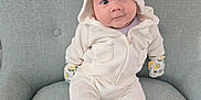 Michael joined the competition — help win amazing prizes! baby, bonnet, cap, clothing, couch, cushion, face, furniture, hat, head, homedecor, hood, hosiery, newborn, pants, person, photography, portrait, sitting, sock