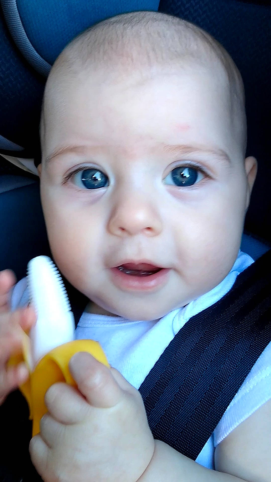 Maeve is registered to the contest to win money with this photo: azure, baby, baby_toddler_clothing, blue, cheek, eye, eyebrow, eyelash, facial_expression, finger, gesture, hand, iris, lip, mouth, nose, organ, person, product, skin