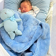 Reyav joined the competition — help win amazing prizes! newborn, baby, sleeping, crib, bassinet, blanket, blue, stuffed_animal, bunny, toy, pillow, infant, portrait, indoors, nursery, cozy, peaceful, swaddled, mesh, bedding