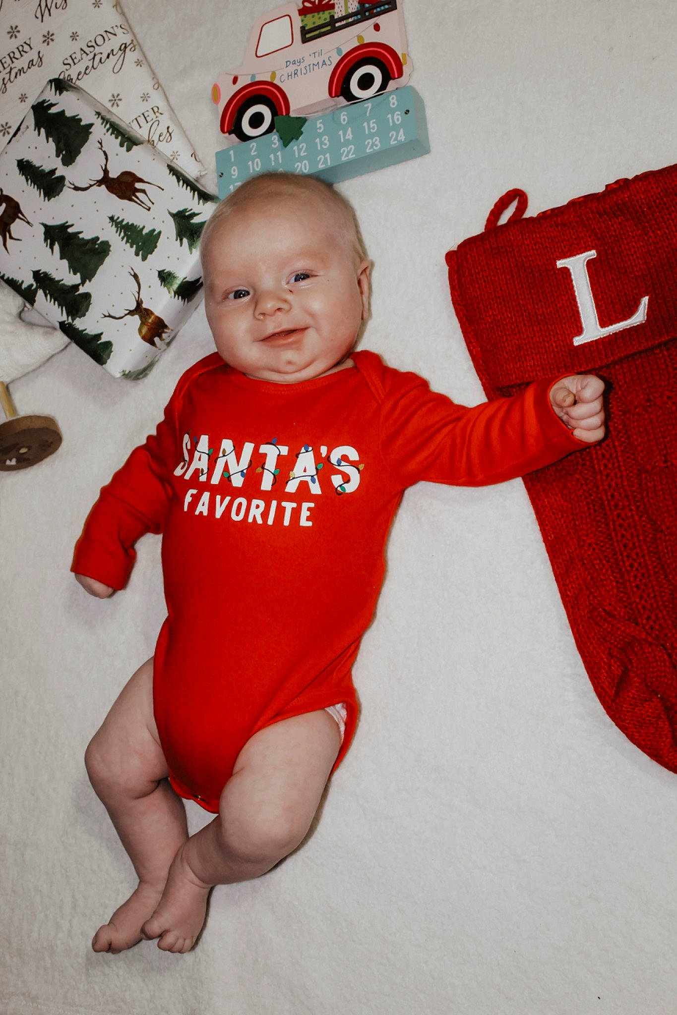 Legend joined the competition — help win amazing prizes! baby, baby_toddler_clothing, barefoot, finger, foot, fun, gesture, happy, human_body, human_leg, infant_bodysuit, pattern, person, red, sleeve, smile, t_shirt, textile, thigh, thumb