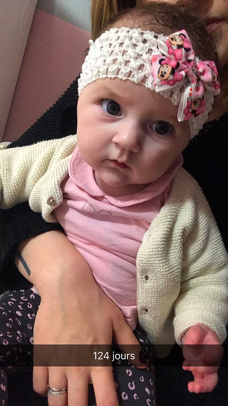 Bethany a rejoint le concours — aidez-le/la à gagner de superbes lots ! beanie, cheek, child, crochet, eye, girl, hair_accessory, head, headgear, infant, knitting, lip, nose, pattern, person, pink, product, skin, smile, textile