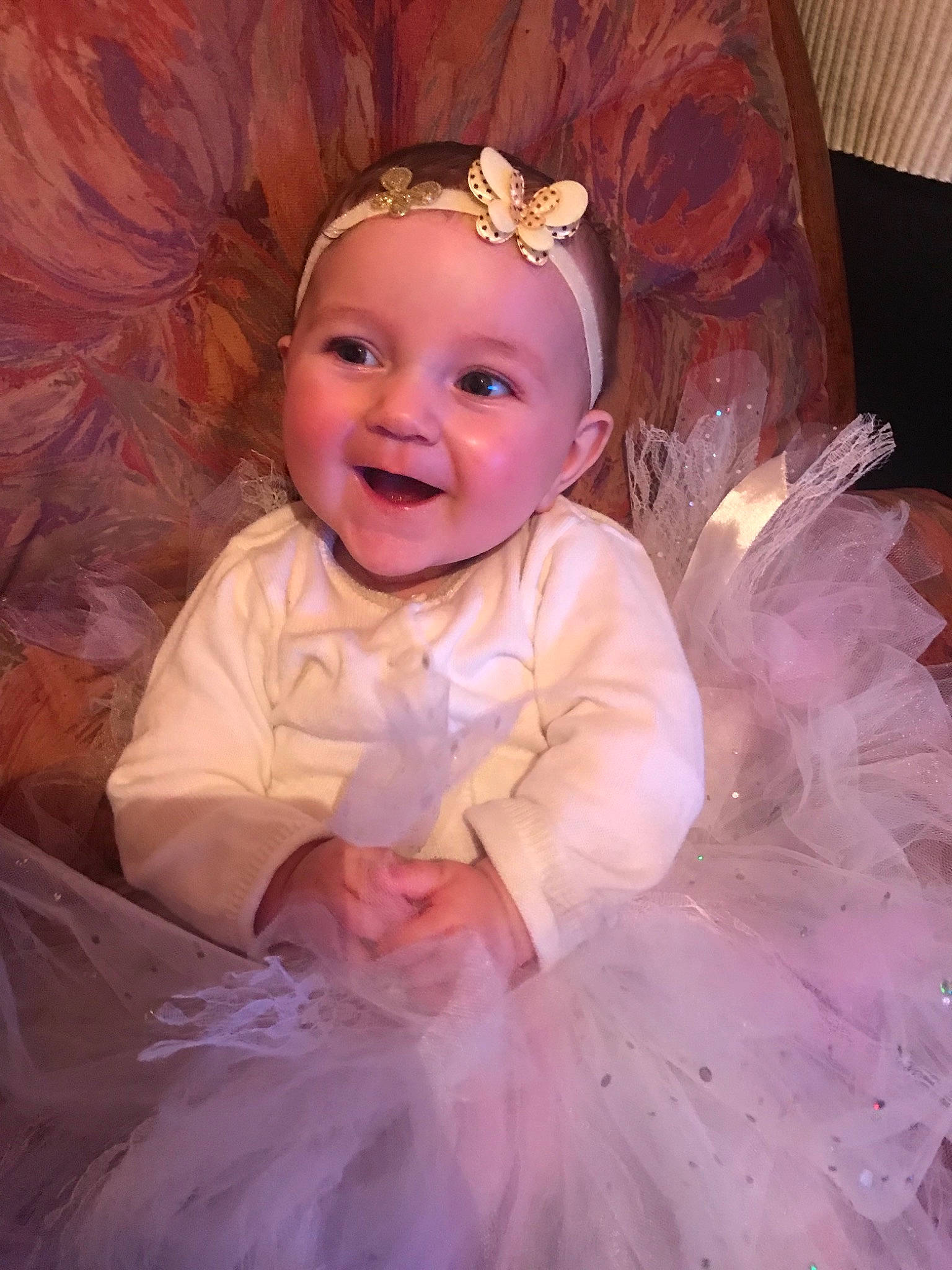 Bethany participe au concours pour gagner de l'argent avec cette photo : cheek, child, costume, eye, face, fun, girl, hair_accessory, happiness, head, headpiece, human_hair_color, infant, iris, person, pink, product, purple, skin, smile