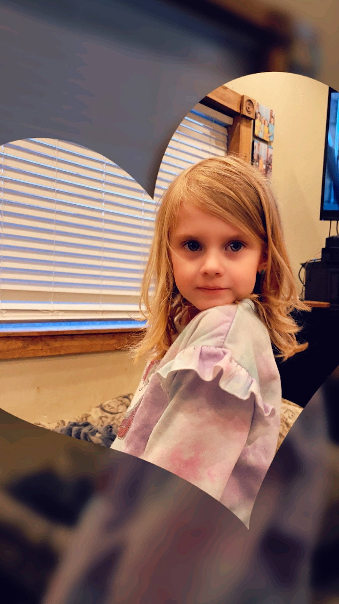 Addilyn is registered to the contest to win money with this photo: bangs, blond, brown_hair, child, eyelash, eyewear, fashion_accessory, fashion_design, formal_wear, fun, happy, iris, long_hair, peach, person, room, shade, sitting, television, tints_and_shades