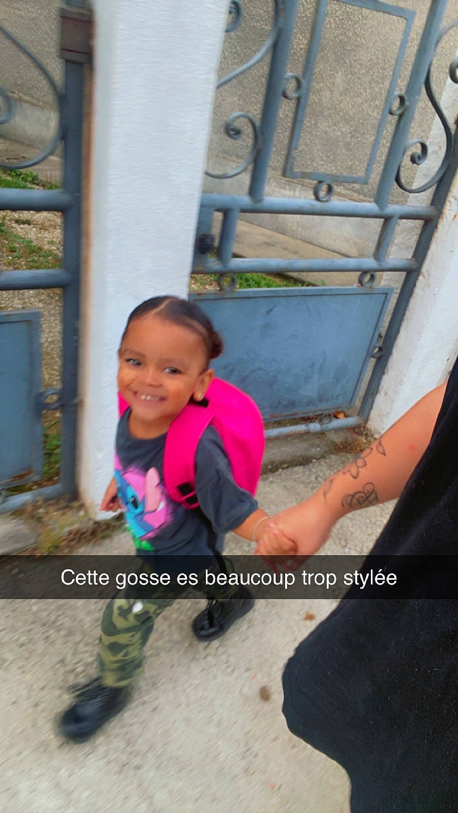 Arhiya participe au concours pour gagner de l'argent avec cette photo : automotive_wheel_system, child, concrete, electric_blue, eye, fun, happy, human_leg, joy, leisure, magenta, person, recreation, road_surface, sandal, sitting, sneakers, soil, t_shirt, toddler