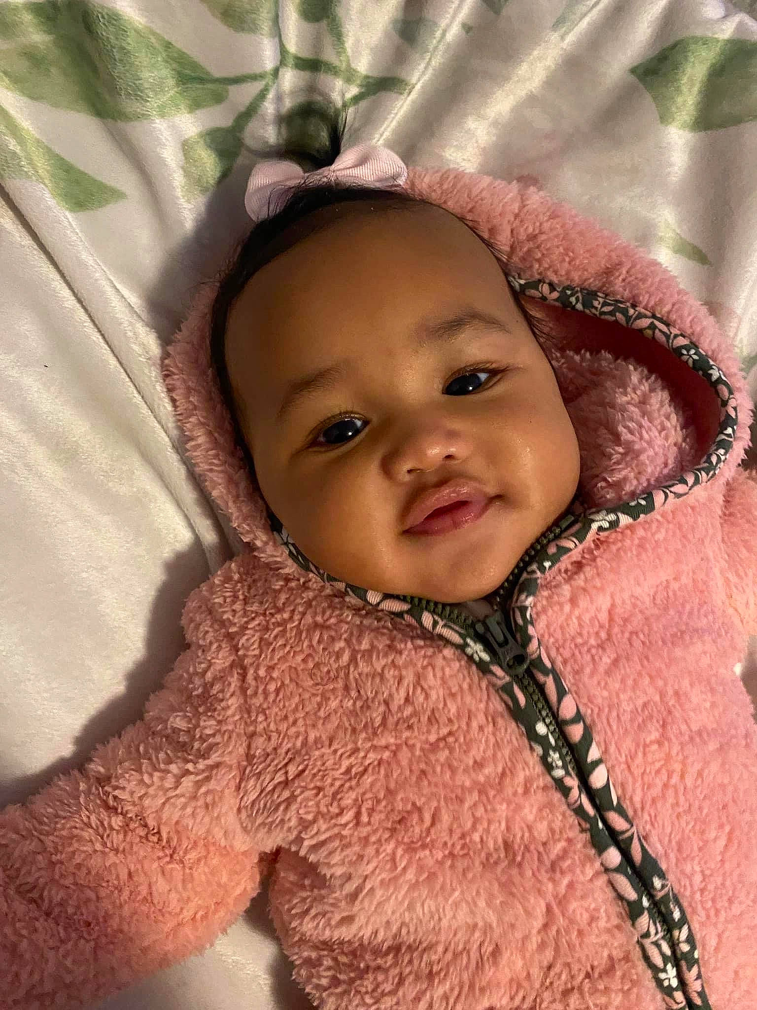 Lana is registered to the contest to win money with this photo: baby, cheek, chin, eye, eyebrow, eyelash, face, facial_expression, happy, head, headgear, human_body, iris, lip, mouth, nose, person, pink, skin, smile