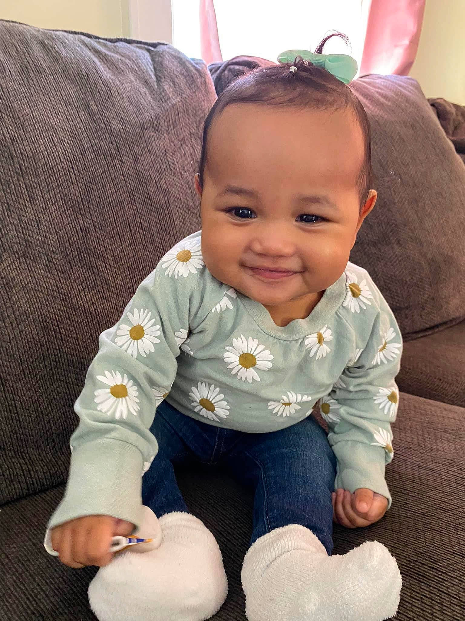 Lana is registered to the contest to win money with this photo: arm, baby, baby_toddler_clothing, blue, cheek, comfort, eye, face, finger, hair, happy, head, human_body, iris, joy, leg, nose, person, product, skin