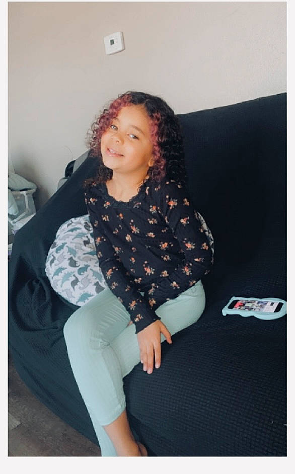 Nevaeh is registered to the contest to win money with this photo: comfort, elbow, electric_blue, fashion_design, flash_photography, fun, happy, human_leg, joy, knee, leggings, long_hair, magenta, pattern, person, sitting, sleeve, smile, sock, sportswear