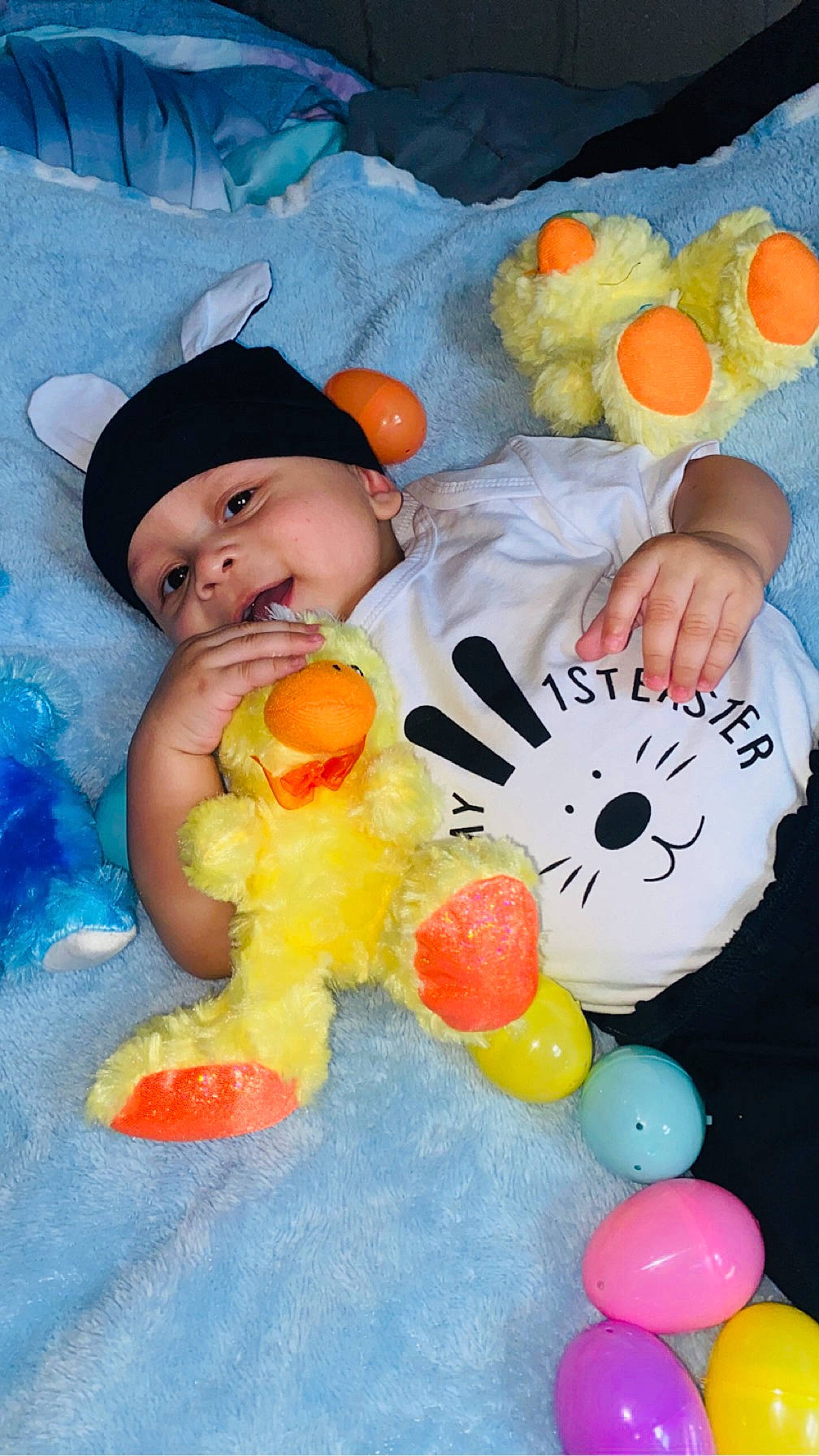 Kane joined the competition — help win amazing prizes! baby, baby_products, baby_safety, baby_sleeping, baby_toddler_clothing, baby_toys, bath_toy, bathing, bathtub, blue, child, comfort, happy, hat, headwear, person, play, plush, stuffed_toy, textile