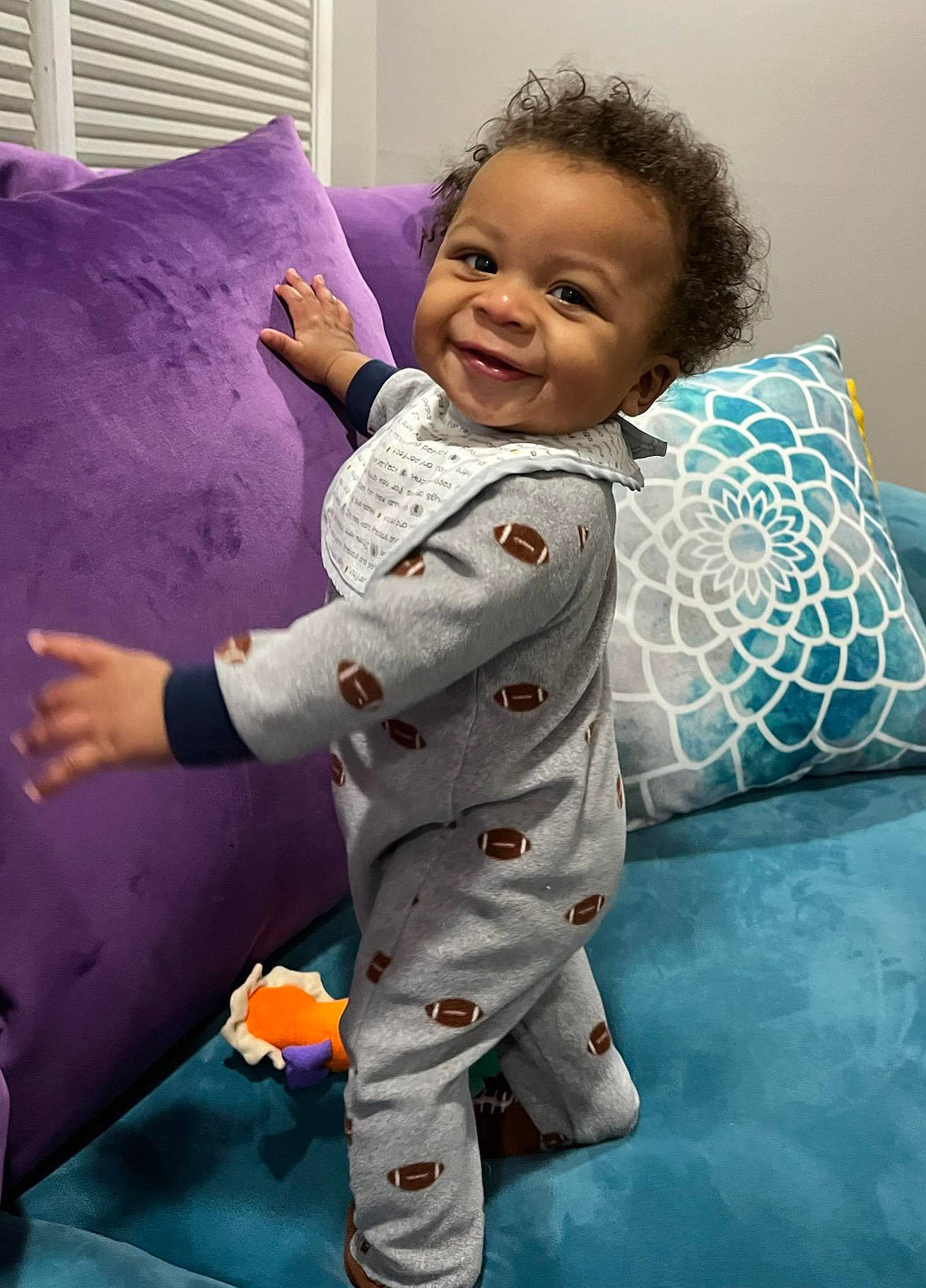 Friedrich joined the competition — help win amazing prizes! arm, baby, baby_toddler_clothing, bed_sheet, bedding, child, comfort, eye, fun, happy, head, joy, linens, person, pillow, product, purple, sleeve, smile, snapshot