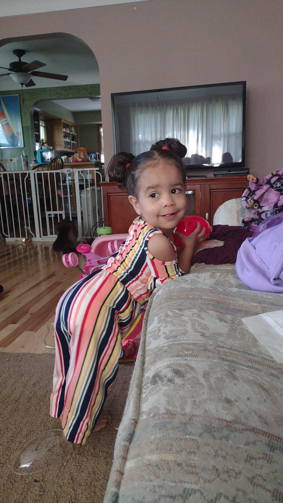 Adalyn is registered to the contest to win money with this photo: baby, chair, child, comfort, curtain, event, fence, flooring, formal_wear, fun, hairstyle, happy, houseplant, human, joy, linens, person, room, sitting, smile