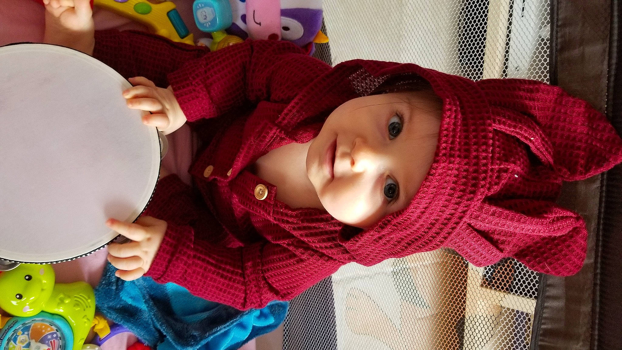 Hélicia participe au concours pour gagner de l'argent avec cette photo : baby, beauty, cap, cheek, child, doll, facial_expression, headgear, headwear, lip, organ, pattern, person, pink, plaid, product, purple, skin, tartan, textile