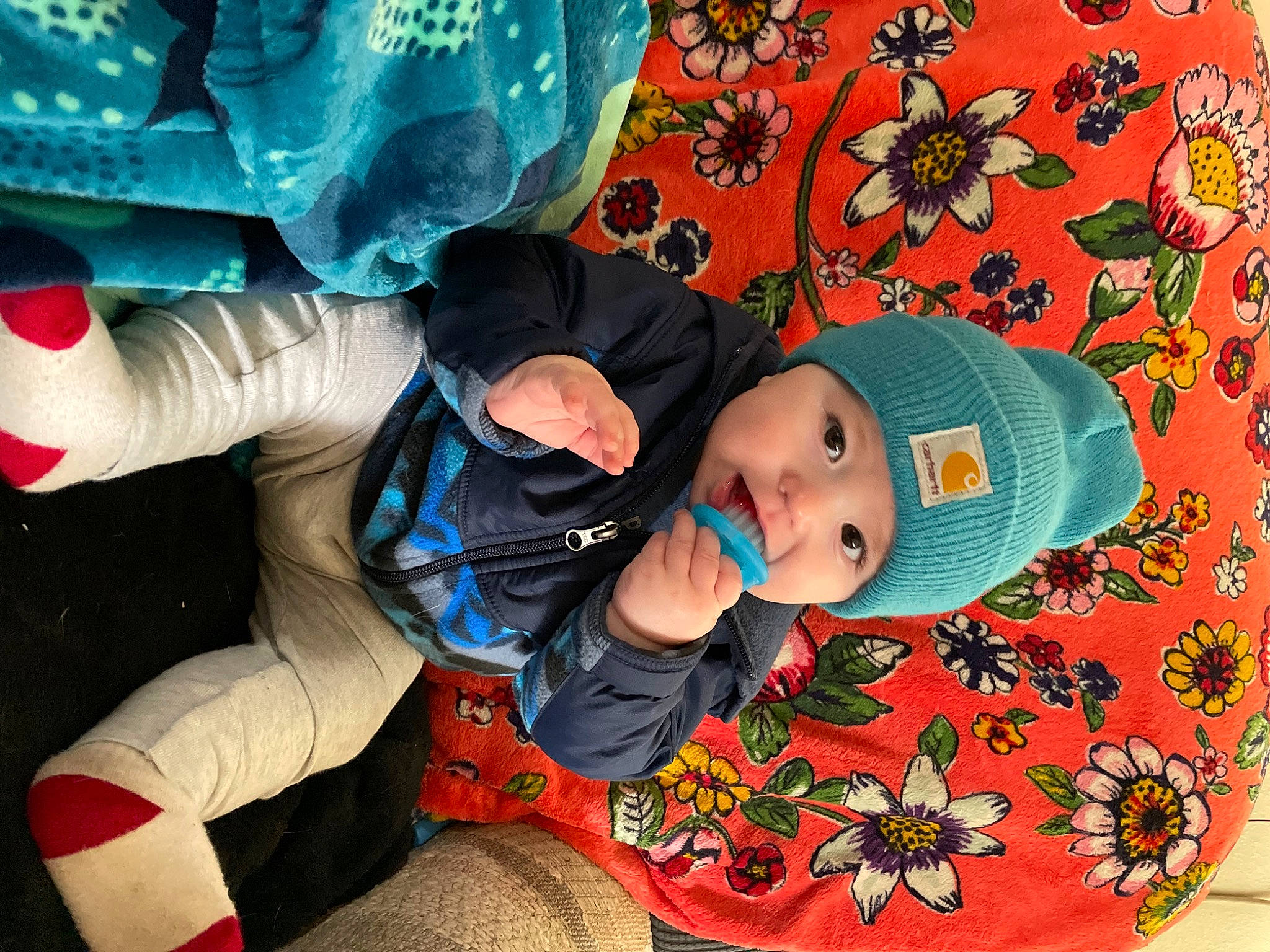 Korbin is registered to the contest to win money with this photo: baby, baby_products, baby_toddler_clothing, carmine, child, comfort, costume_hat, electric_blue, fashion_accessory, fictional_character, fun, happy, headgear, headwear, linens, pattern, person, play, sun_hat, toddler