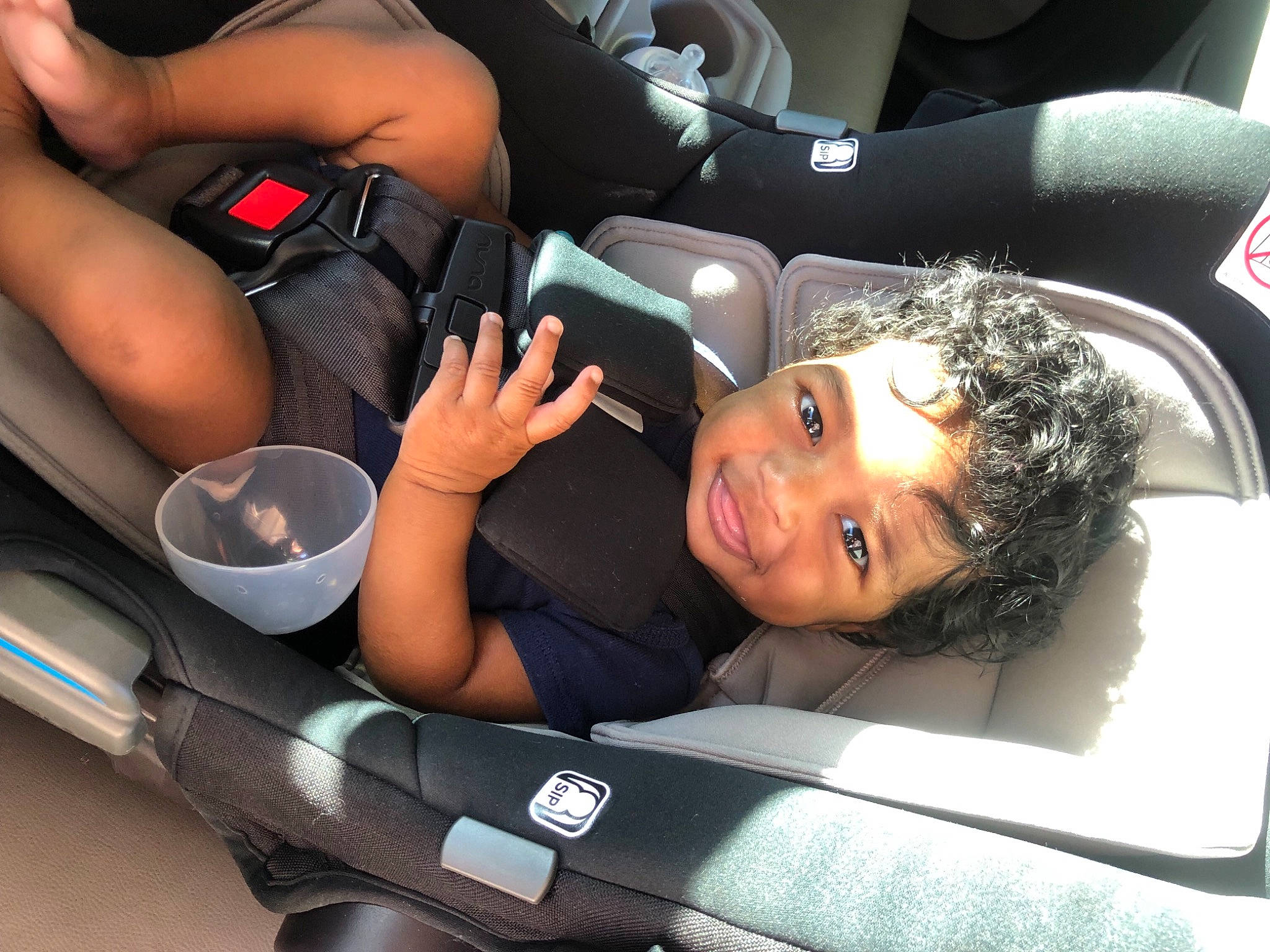 Jasai is registered to the contest to win money with this photo: auto_part, automotive_design, automotive_exterior, car, car_seat, car_seat_cover, comfort, elbow, fun, gesture, head_restraint, joy, motor_vehicle, person, personal_luxury_car, seat_belt, smile, steering_wheel, thigh, thumb