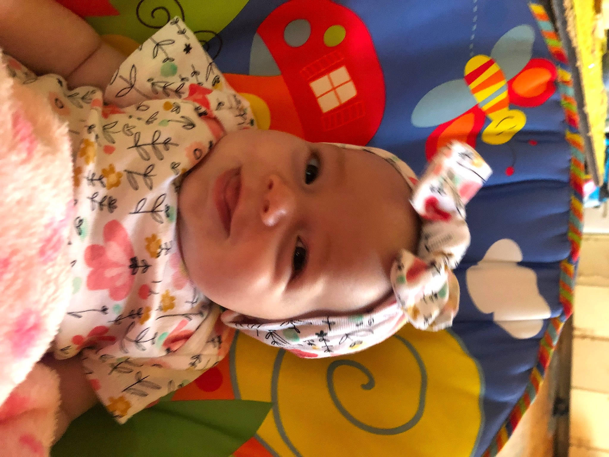 Melanie joined the competition — help win amazing prizes! baby, baby_products, baby_toddler_clothing, bib, cheek, child, fun, happy, mouth, orange, pattern, person, room, toddler, yellow