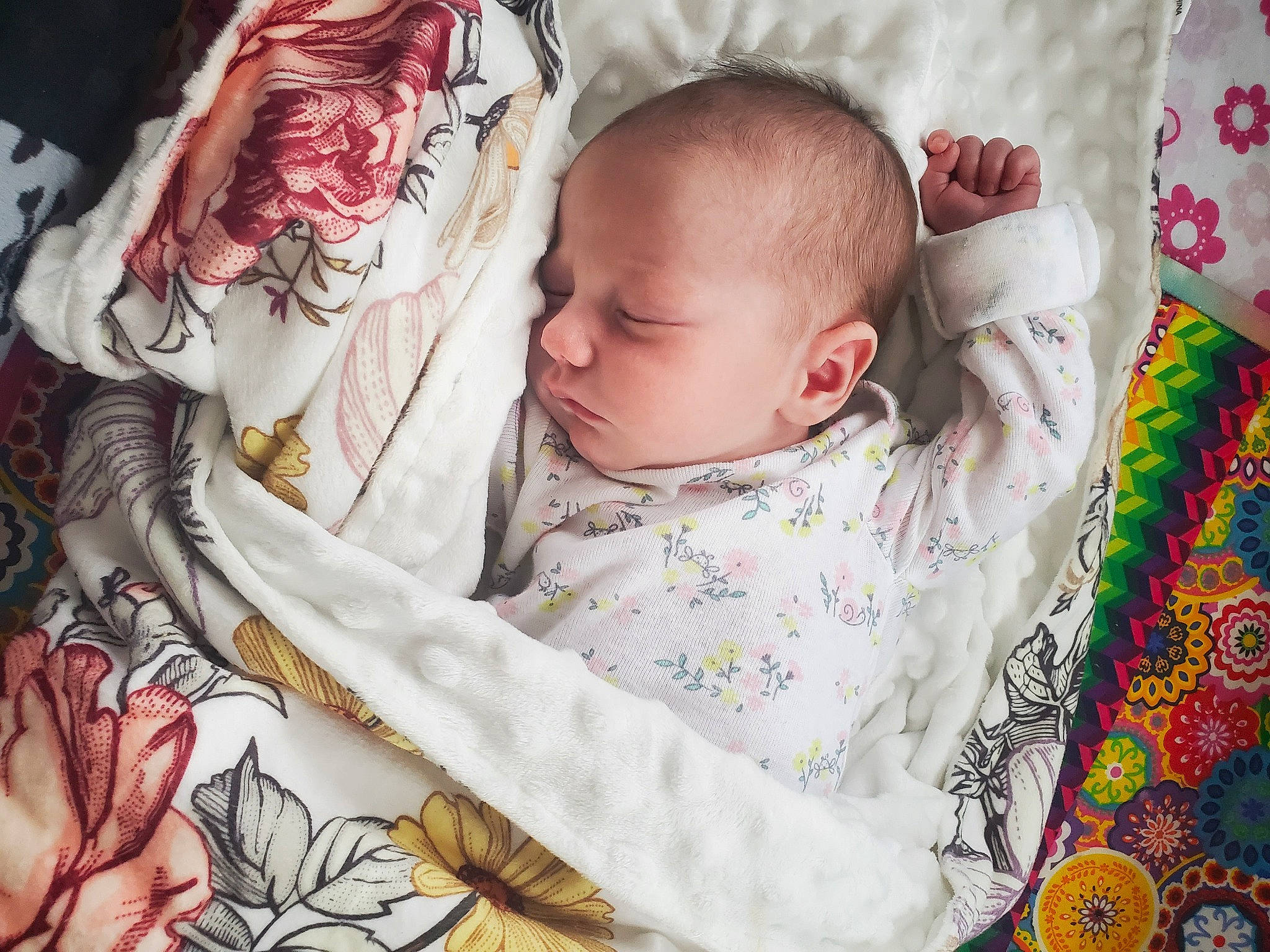Evelyn joined the competition — help win amazing prizes! baby, baby_products, baby_sleeping, baby_toddler_clothing, bedding, bedtime, cheek, child, comfort, happy, linens, pattern, person, petal, pink, portrait_photography, product, room, skin, textile