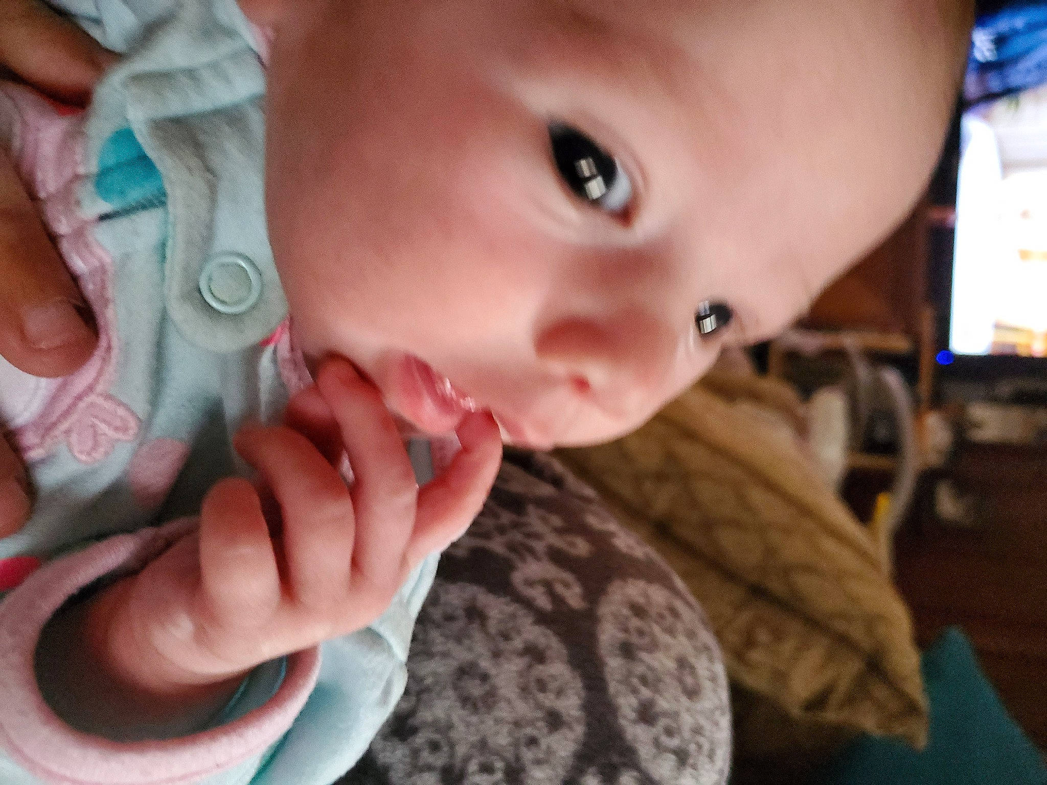 Evelyn is registered to the contest to win money with this photo: baby, baby_toddler_clothing, cheek, ear, eye, eyebrow, eyelash, finger, gesture, hand, happy, iris, lip, mouth, neck, nose, skin, smile, thumb, toddler