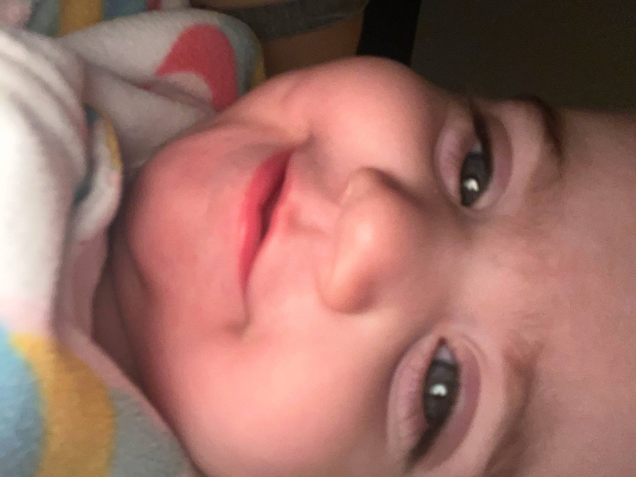 Kennedy is registered to the contest to win money with this photo: cheek, chin, ear, eye, eyebrow, eyelash, forehead, gesture, hair, hand, head, headwear, human_body, iris, jaw, lip, mouth, neck, nose, person