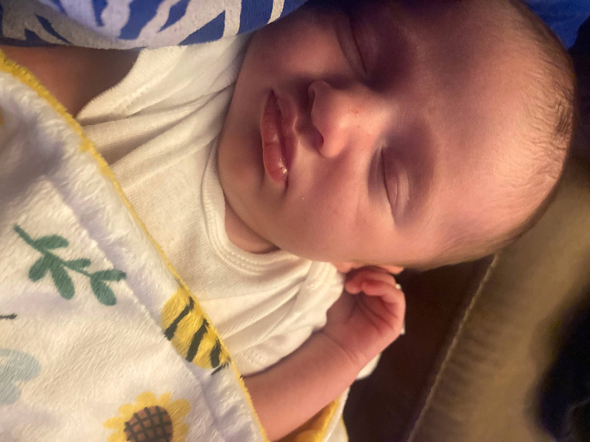 Olivia Rae is registered to the contest to win money with this photo: baby, baby_sleeping, baby_toddler_clothing, blue, cheek, child, close_up, comfort, ear, eyebrow, eyelash, finger, forehead, happy, mouth, nose, person, skin, sleeve, thumb