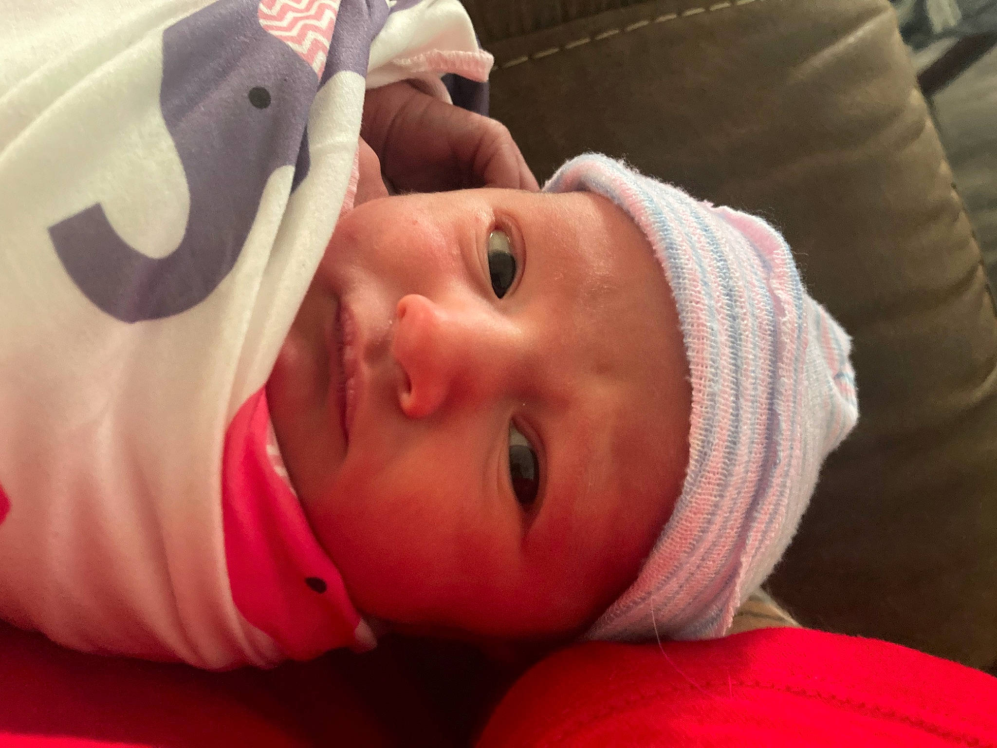 Olivia Rae is registered to the contest to win money with this photo: baby, baby_products, baby_safety, baby_toddler_clothing, cap, cheek, child, comfort, eyebrow, eyelash, hand, hat, head, headgear, headwear, lip, mouth, nose, person, room