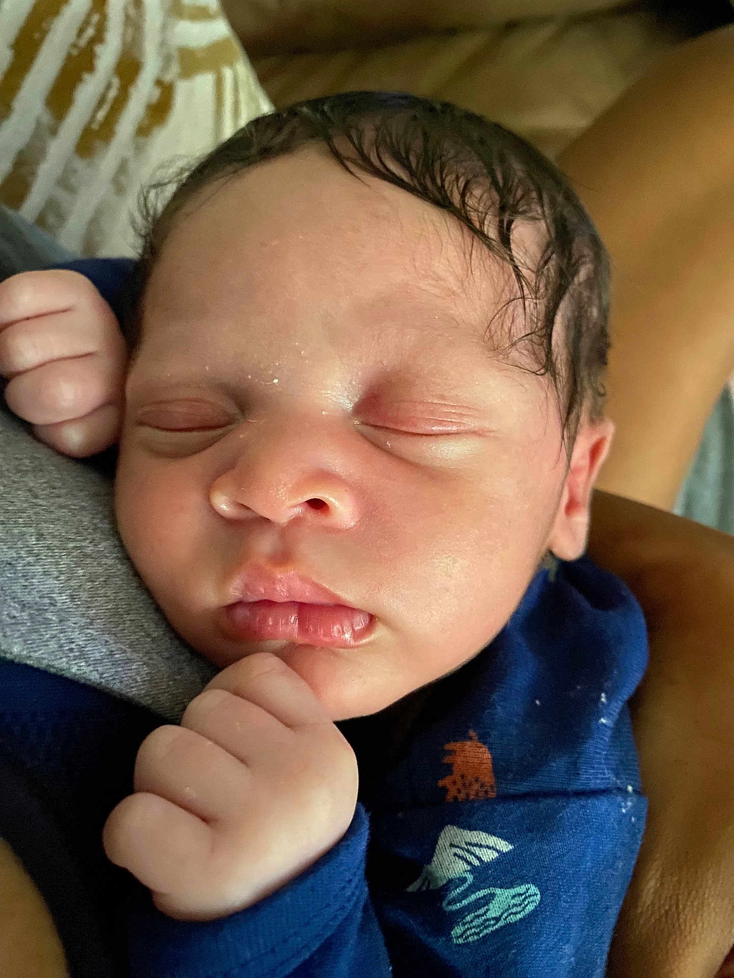 Roman is registered to the contest to win money with this photo: baby, newborn, sleeping, face, hand, clothing, infant, peaceful, skin, person, closeup, cute, resting, portrait, young, child, fingers, tiny, warm, cozy