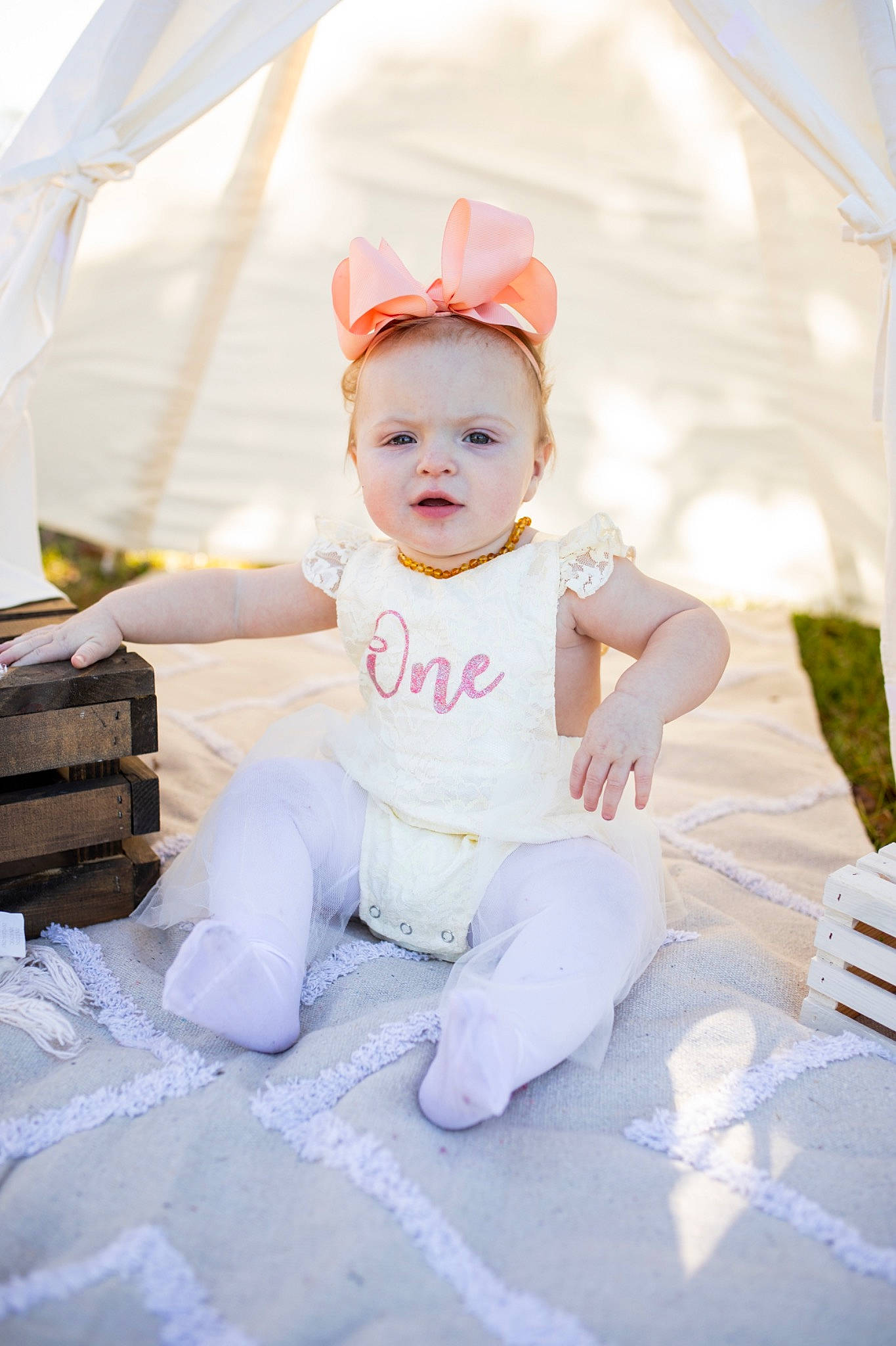 Emerson joined the competition — help win amazing prizes! baby, baby_toddler_clothing, child, costume, dress, fashion_accessory, flash_photography, fun, grass, hair_accessory, happy, hat, headband, headpiece, peach, person, portrait_photography, sitting, sleeve, smile