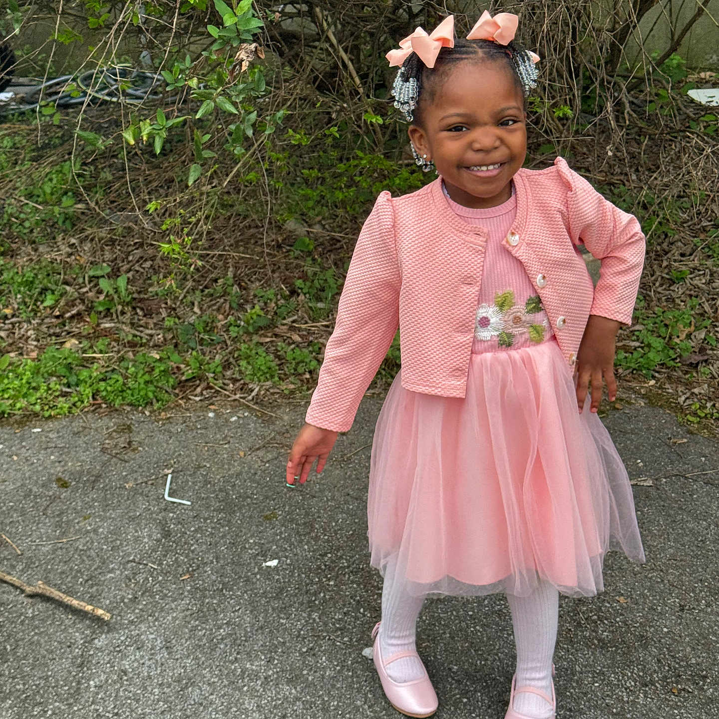 Ava is registered to the contest to win money with this photo: child, city, clothing, coat, costume, dress, face, female, footwear, girl, grass, head, person, photography, plant, portrait, road, shoe, street, urban