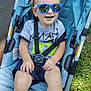 Huxon joined the competition — help win amazing prizes! baby, casual, child, feet, grass, happy, nature, outdoor, person, reflection, seatbelt, shirt, shorts, smile, socks, stroller, summer, sunglasses, sunlight, toddler