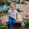 Huxon is registered to the contest to win money with this photo: toddler, child, bench, garden, pond, flowers, plants, easter, bunny, decoration, stone, pathway, grass, outdoor, smiling, casual_clothing, nature, spring, playful, daytime