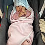 Zarish is registered to the contest to win money with this photo: baby, blanket, bonnet, car, clothing, cushion, face, happy, hat, head, homedecor, hood, newborn, person, photography, portrait, sleeping, smile, transportation, vehicle