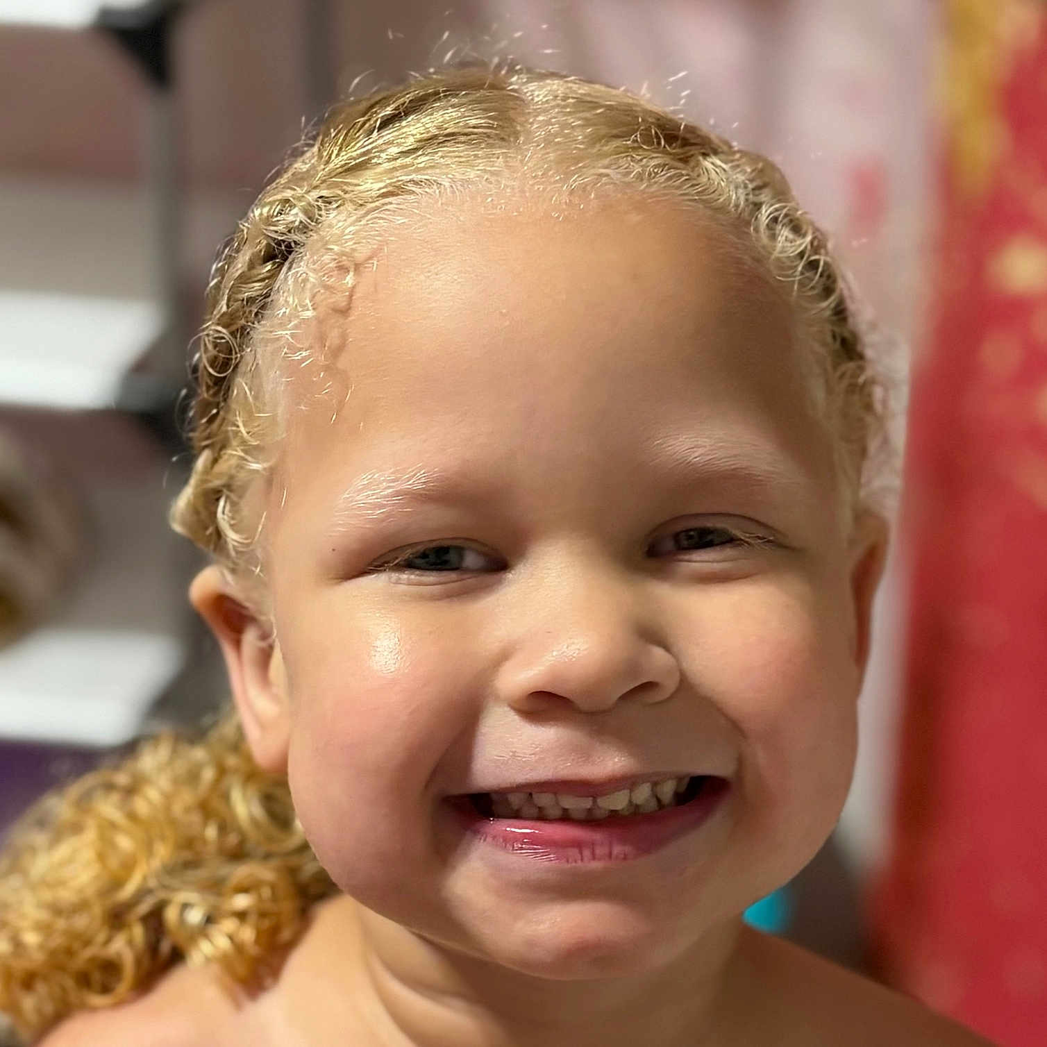 Nyomi joined the competition — help win amazing prizes! background_blur, blonde, child, childhood, closeup, curly_hair, cute, expression, face, hair, happy, head, indoor, joy, person, portrait, skin, smile, teeth, young