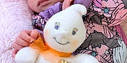 Eden is registered to the contest to win money with this photo: baby, sleeping, plush_toy, blanket, headband, onesie, purple, pink, child, infant, soft_texture, cute, peaceful, hand, face, smile, toy, cozy, portrait, resting
