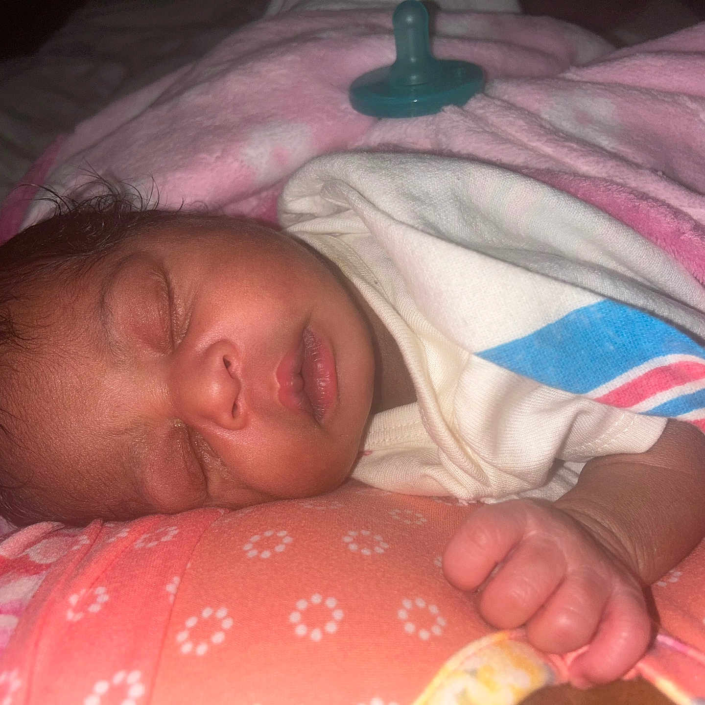 Royale is registered to the contest to win money with this photo: baby, blanket, child, closeup, clothing, cozy, cute, face, hand, infant, newborn, pacifier, peaceful, pink, portrait, resting, sleeping, soft, toddler, wrapped