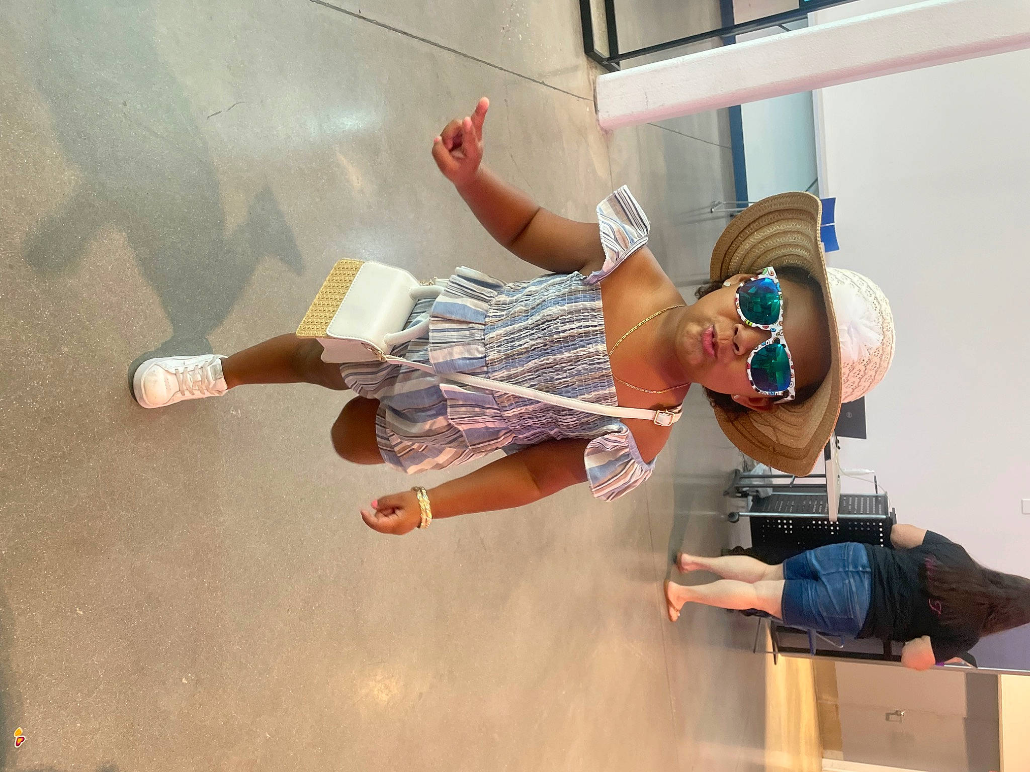 Kelani is registered to the contest to win money with this photo: art, elbow, eyewear, finger, fun, gesture, hand, happy, headwear, human_leg, joint, knee, leisure, paint, person, plaster, room, sandal, thigh, thumb