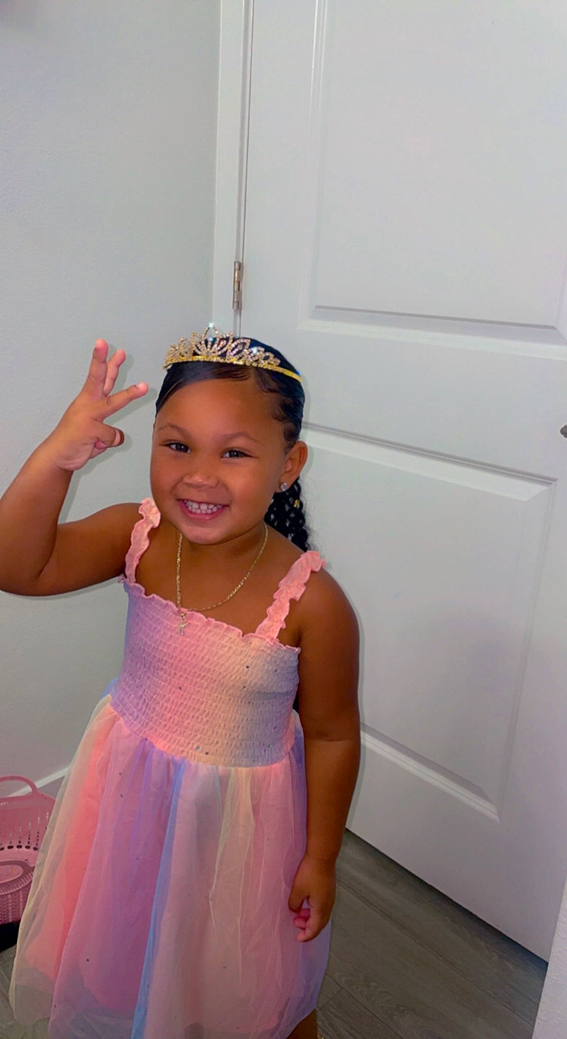 Kelani joined the competition — help win amazing prizes! baby_toddler_clothing, day_dress, dress, embellishment, fashion_design, finger, gesture, happy, hat, headpiece, jewellery, joy, magenta, neck, necklace, person, pink, shoulder, skin, sleeve