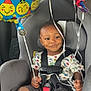 toddler, child, car_seat, birthday_balloons, smiling, harness, dinosaur_shirt, seatbelt, car_interior, celebration, party, colorful, happy, infant, young_child, sitting, vehicle, strapped_in, cute, ribbons