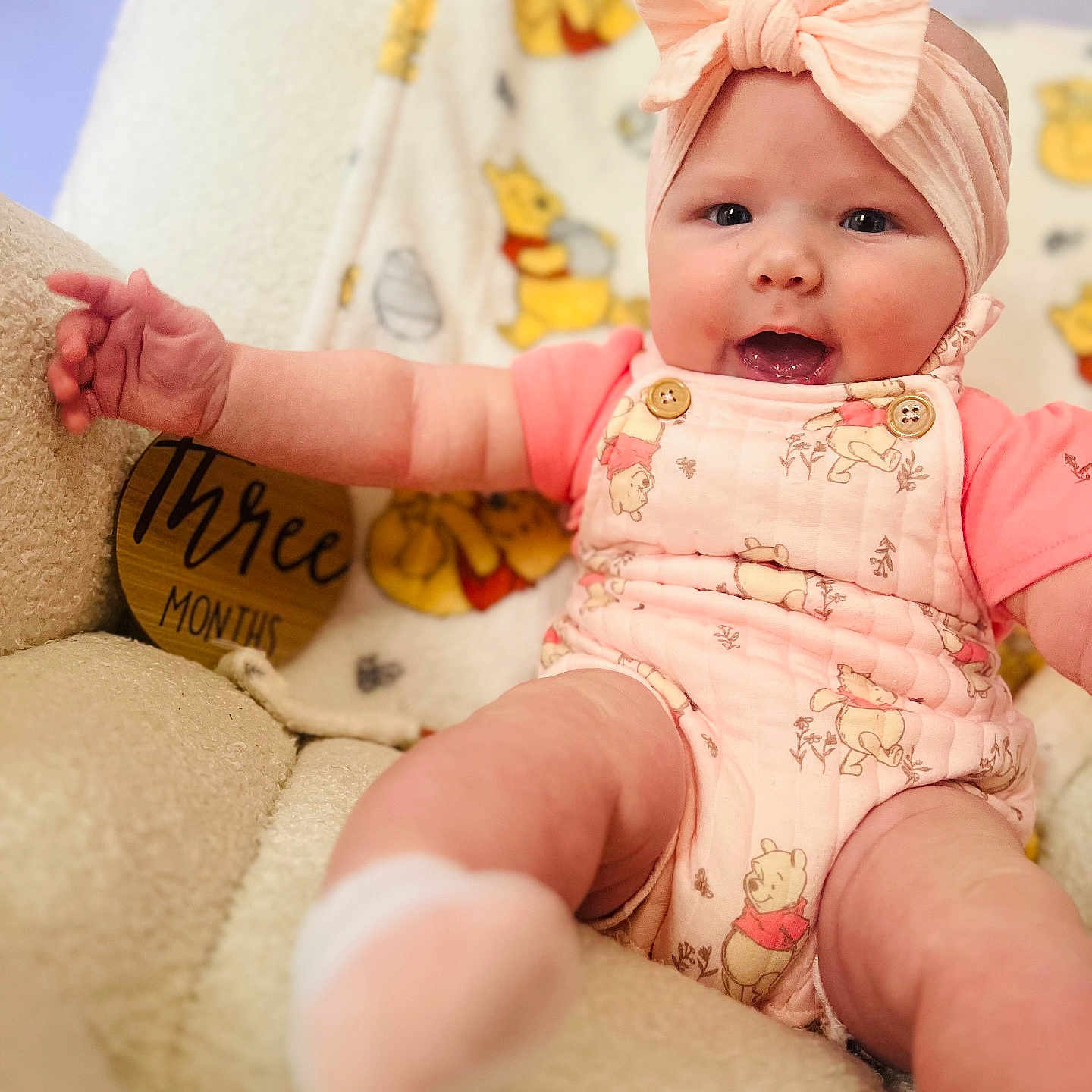 Allieanne is registered to the contest to win money with this photo: baby, baby_girl, child, chubby_cheeks, clothing, cozy, cute, happy, headband, indoors, infant, onesie, pink_bow, plush, portrait, sitting, smile, soft_chair, three_months, winnie_the_pooh