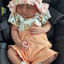baby, infant, sleeping, car_seat, hat, clothing, peach_color, white_socks, cute, child, adorable, starfish, patterned_clothing, car_safety, resting, small_hands, soft_fabric, toddler, seatbelt, leisure
