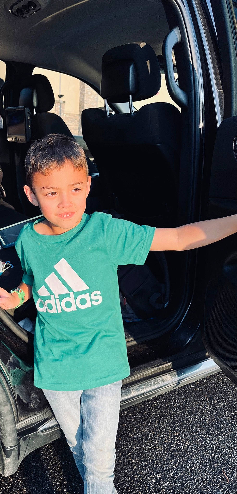 Dalton joined the competition — help win amazing prizes! auto_part, automotive_design, automotive_exterior, automotive_tire, automotive_wheel_system, black_hair, bumper, cool, electric_blue, mode_of_transport, motor_vehicle, person, product, rim, standing, steering_wheel, t_shirt, tire, vehicle, vehicle_door