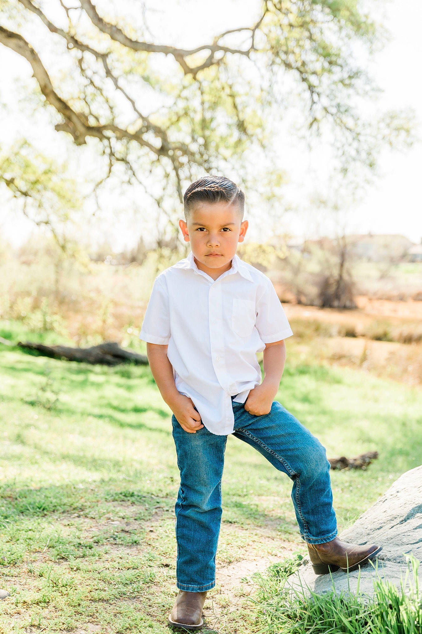 Saul joined the competition — help win amazing prizes! branch, child, denim, flash_photography, forest, fun, gesture, grass, grassland, happy, jeans, leisure, people_in_nature, person, plant, recreation, sitting, sky, toddler, tree