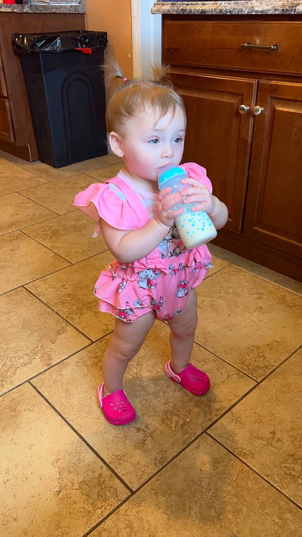 Zendaya is registered to the contest to win money with this photo: baby, baby_toddler_clothing, cabinetry, cheek, child, door, drawer, event, floor, flooring, foot, happy, hardwood, human_leg, leg, person, pink, skin, thigh, toddler