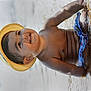 toddler, child, water, hat, smile, happy, outdoor, play, summer, skin, bare_chest, sitting, water_surface, reflection, sunlight, cute, joy, fun, baby, nature