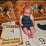 baby, bare_feet, bed, blanket, child, denim, fabric, family_photo, horse, horses, indoor, infant, milestone_photo, number_four, overalls, portrait, sitting, text, wanted_poster, western_theme