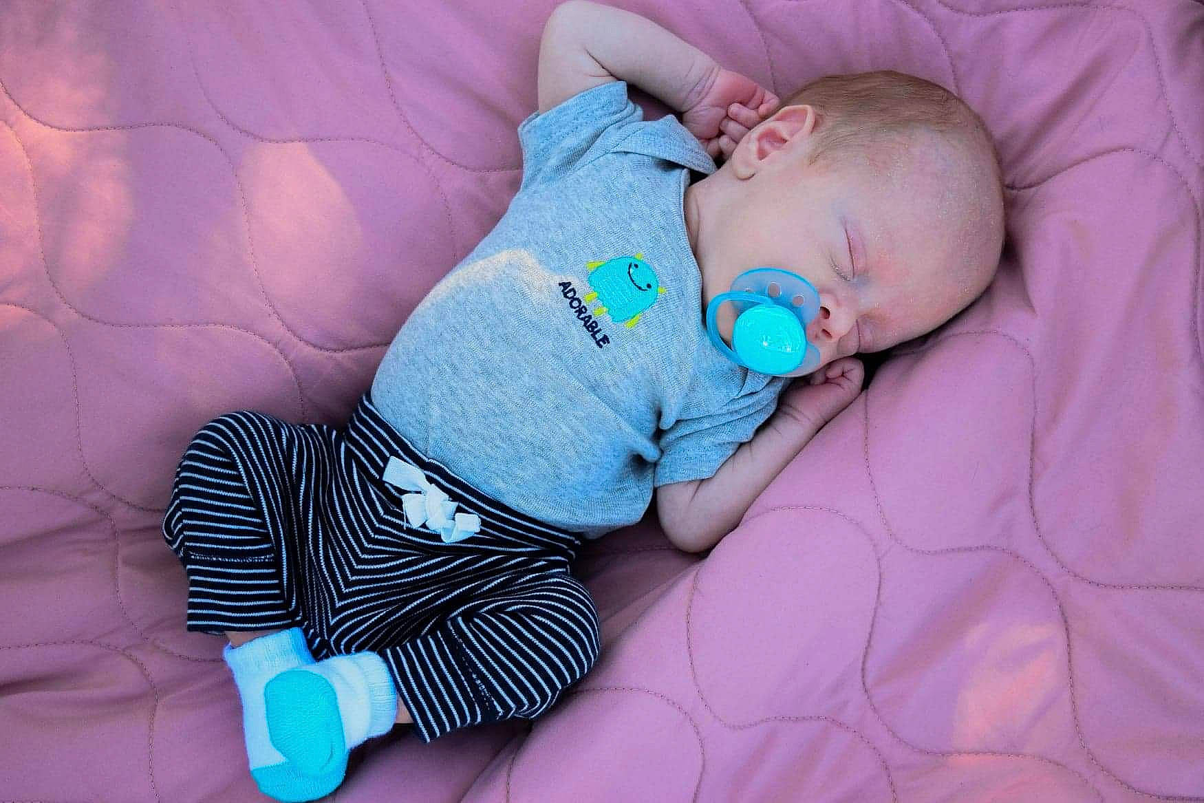 Atreus is registered to the contest to win money with this photo: baby, blue, child, nap, person, sleep, toddler, turquoise