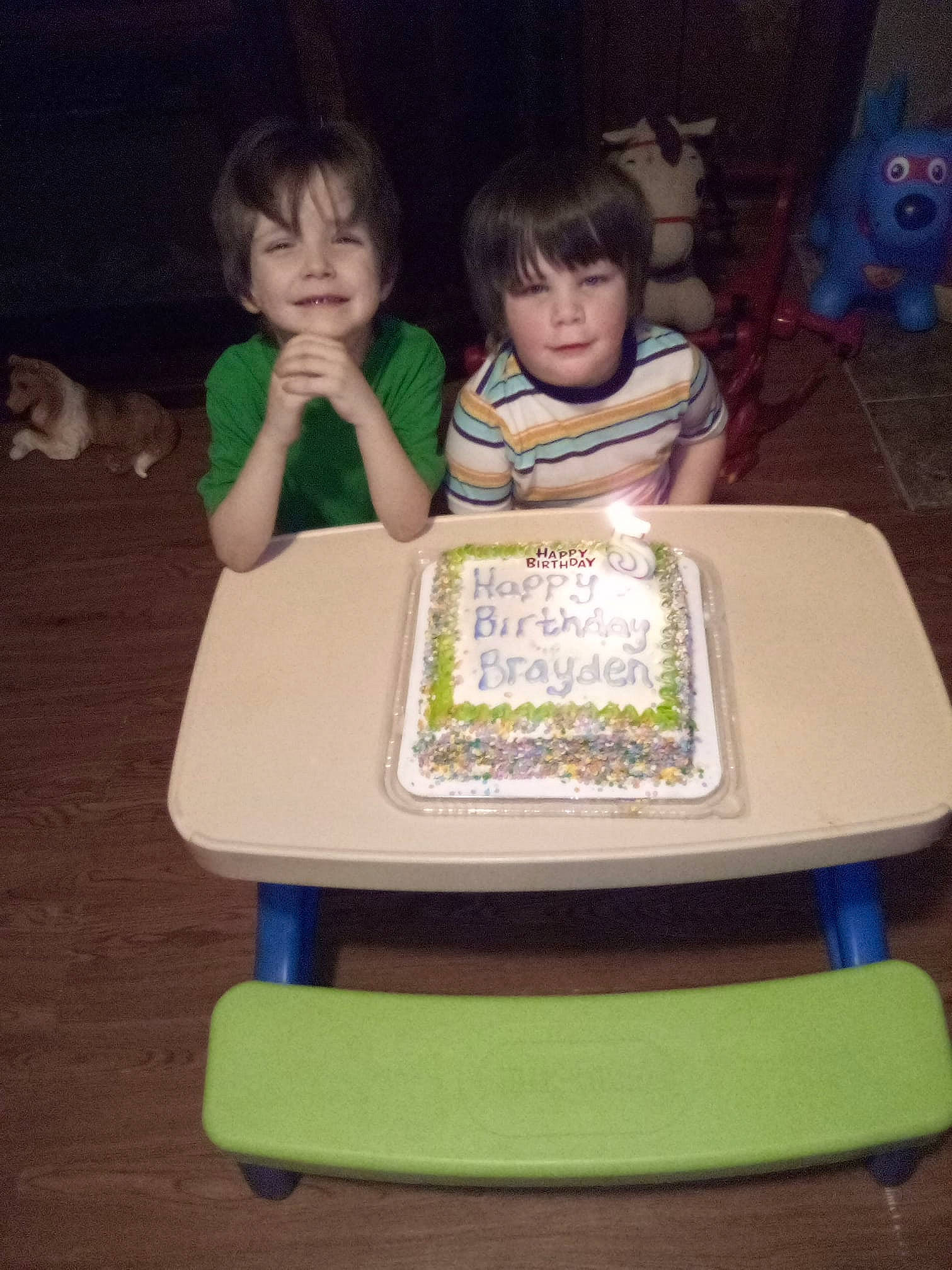 Evan And Brayden joined the competition — help win amazing prizes! birthday_cake, chair, child, dessert, event, face, fun, furniture, games, hair, head, indoor_games_and_sports, joy, leisure, person, recreation, room, sharing, sitting, t_shirt