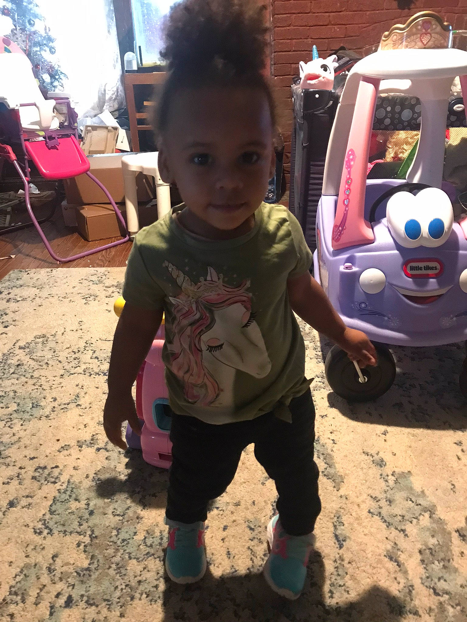 Justice is registered to the contest to win money with this photo: beauty, chair, child, cool, eyewear, flooring, fun, happy, head, leisure, person, pink, play, public_space, recreation, sitting, sneakers, t_shirt, toddler, toy