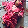 Lynaïa participe au concours pour gagner de l'argent avec cette photo : baby, infant, pink_clothing, pacifier, headband, bow, slippers, blanket, floral_pattern, cute, lying_down, indoors, soft_texture, child, adorable, infant_clothing, peaceful, sleepwear, cozy, portrait